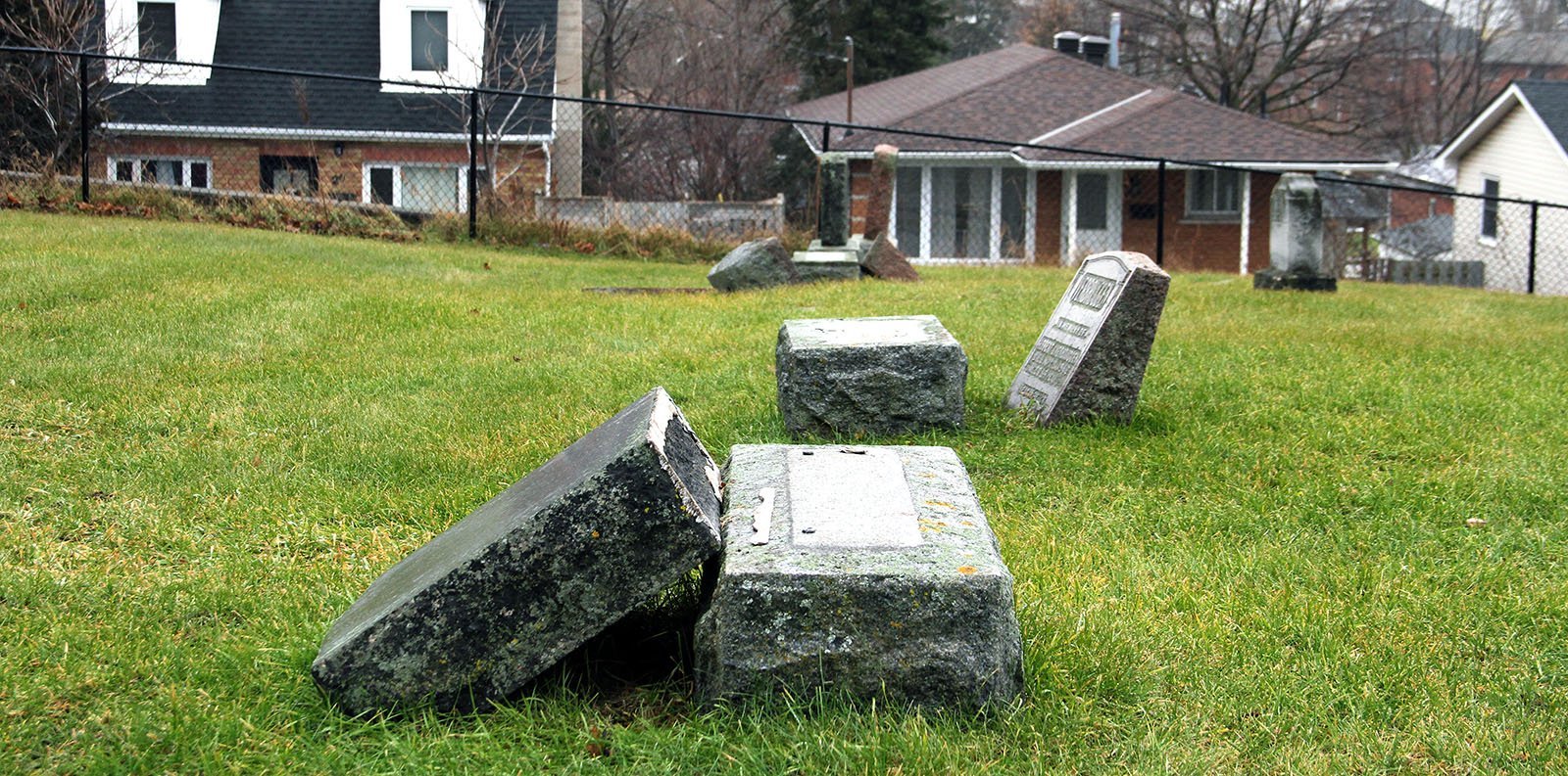 More than three dozen headstones have been knocked over or vandalized at St. Patrick's Cemetery, adjacent to Avenue Road.