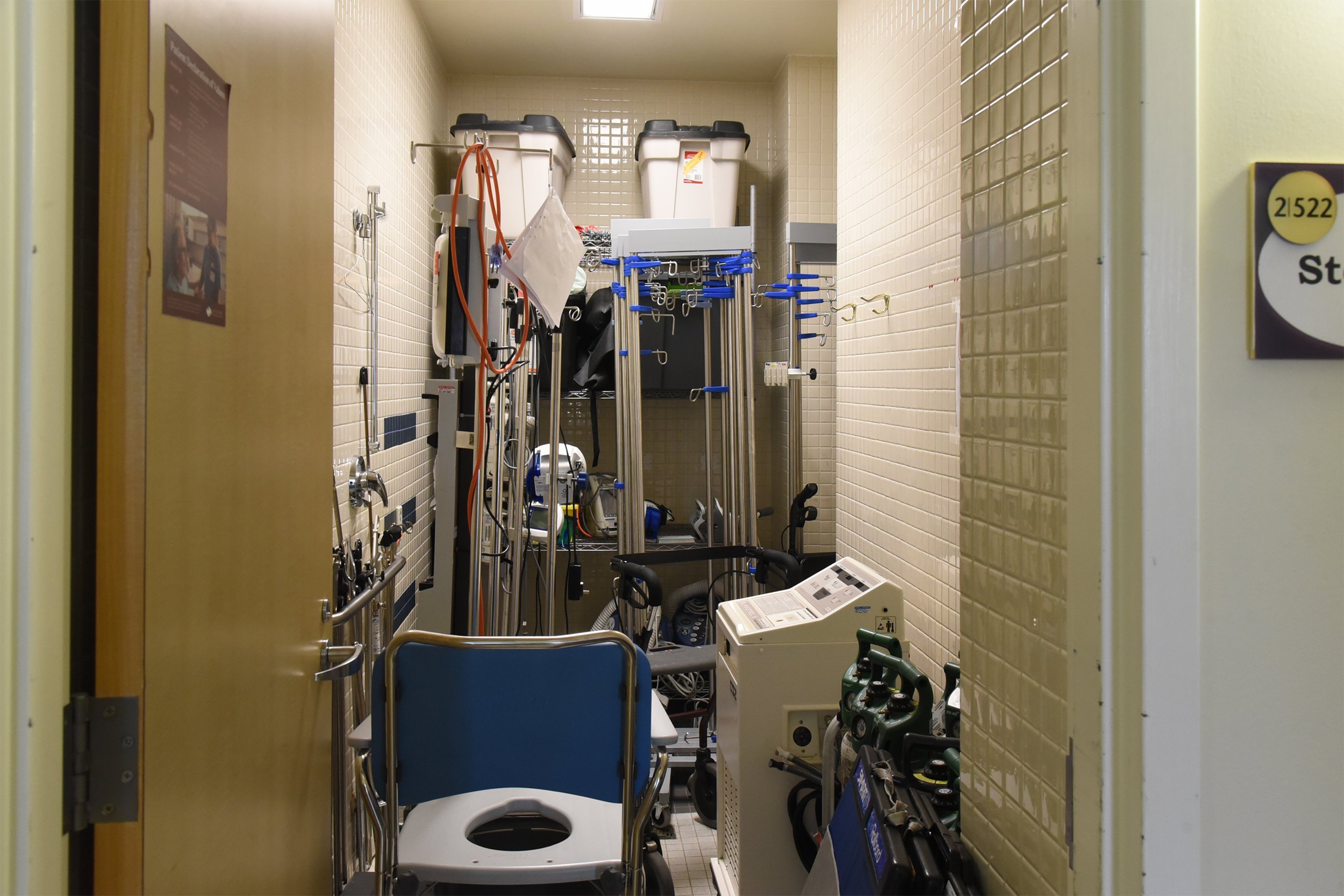 A hospital storage closet full of equipment