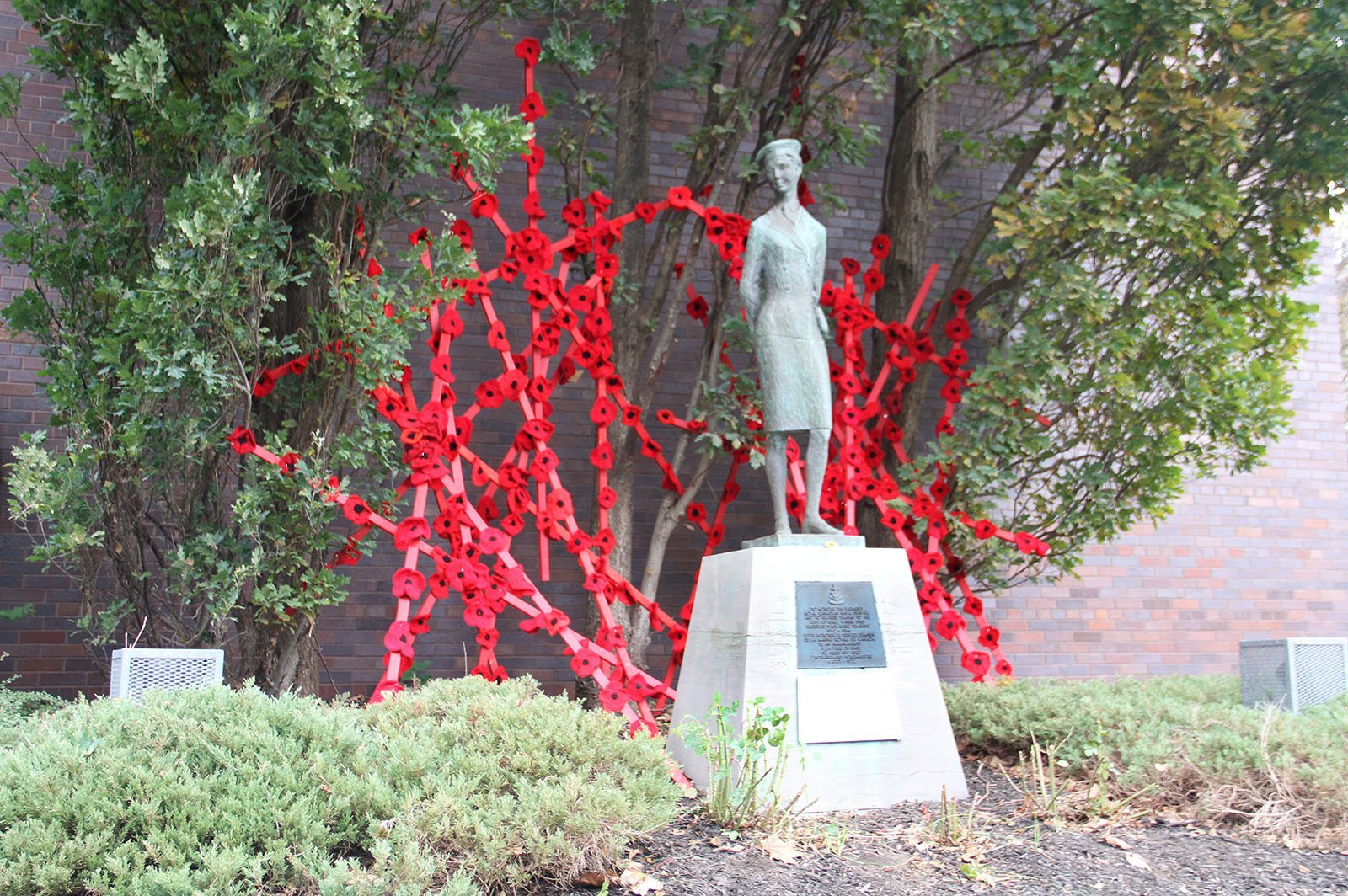 The Jenny Wren statue was one of two spots that was adorned with the Poppy Project installations on Oct. 28.